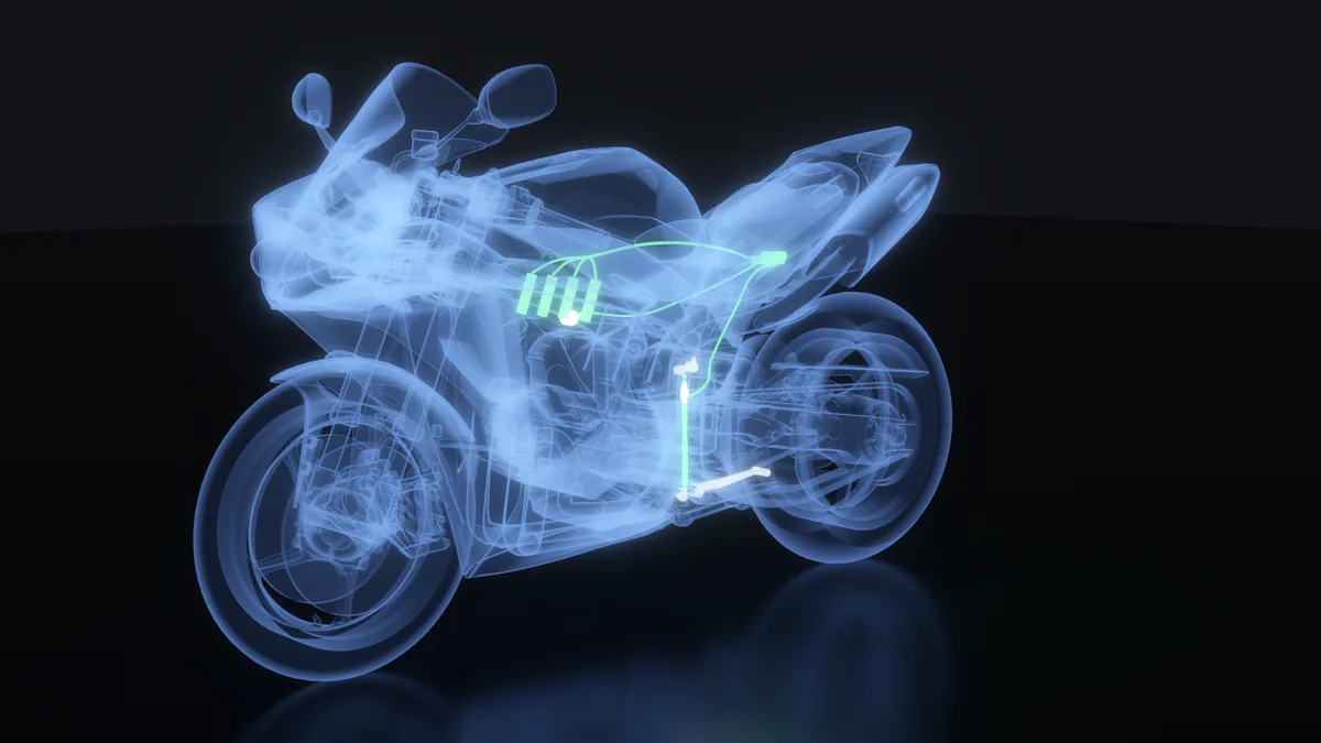 Raio-X de uma Yamaha R1 com o SkidShifter Blipper: haste com o sensor strain gauge no câmbio, sensor do acelerador, bobinas e módulo acesos em verde